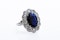 A remarkable Oval Sapphire & Diamond Cluster Ring mounted in Platinum, French, Circa 1935 - image 3