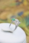 An extraordinarily stylish and finely made Platinum "Art Deco" 1.00 Carat Diamond & two "Square Cut" Emerald Ring, Circa 1935 - image 3