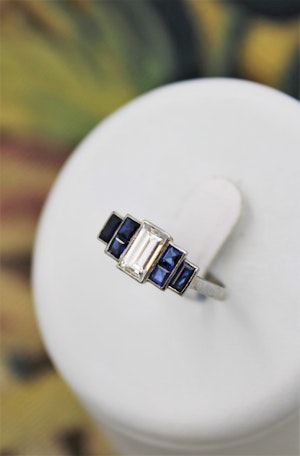 A very beautiful Art Deco 0.75 Carat Diamond and Sapphire Engagement Ring mounted in Platinum, English, Circa 1925
