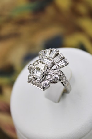 An unusual "Art Deco" Diamond & Platinum Dress Ring, Circa 1945