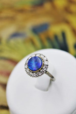 Downstairs at Grays, an Exceptional Vintage Black Opal, Diamond and Platinum (tested) Diamond Cluster Ring, Continental, Circa 1950.
