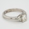 Emerald cut diamond ring with triangular cut diamond shoulders - image 2