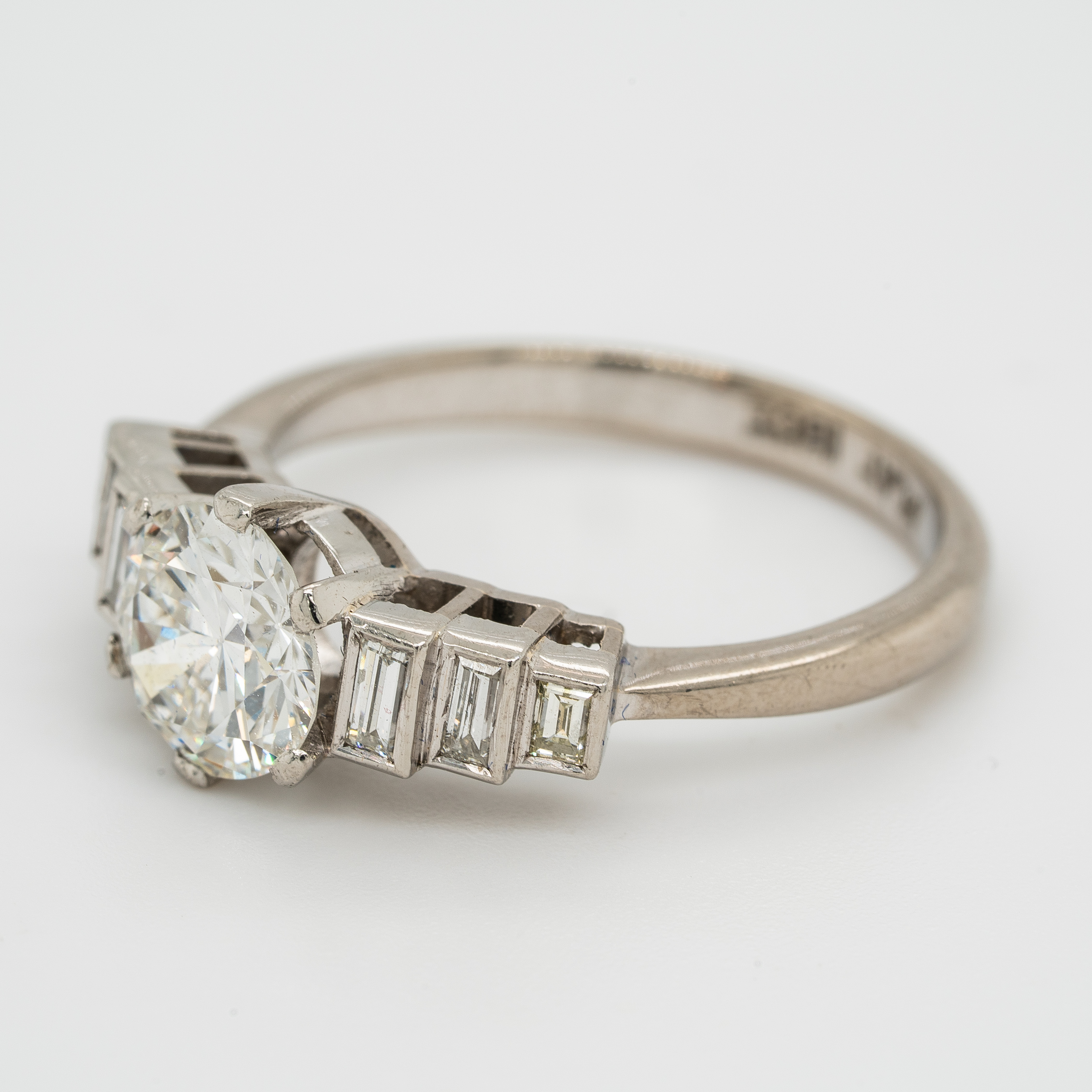 solitaire and baguette diamond ring