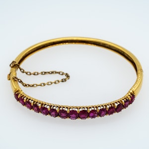 Victorian Bangle with approx 12.0 ct of rubies. With certificate