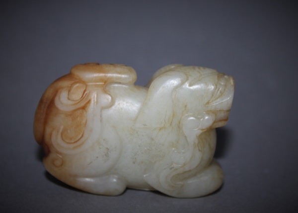 A Chinese jade figure of a Buddhistic lion. - image 3