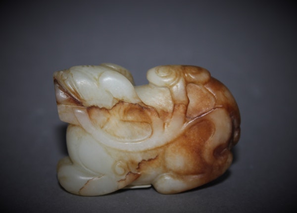 A Chinese jade figure of a Buddhistic lion. - image 2