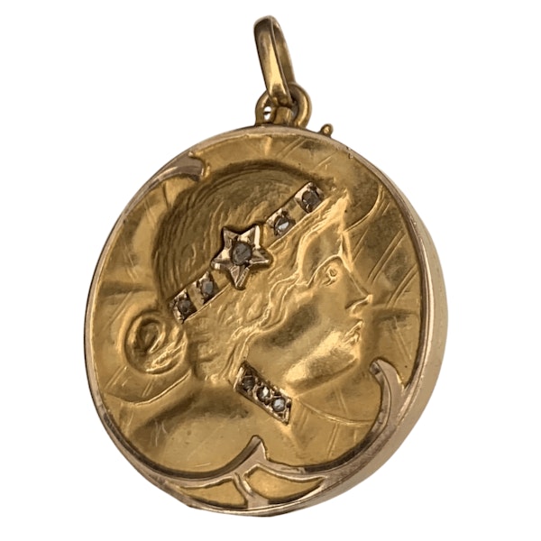 An Art Nouveau Gold and Diamond Repousse Locket - image 3