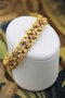 A very fine 18 Carat Green, Yellow and Pink Gold (French marked) Ruby set bracelet, French, Circa 1935 - image 1