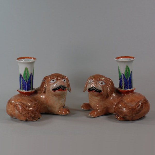 Pair of Chinese famille rose recumbent pug dog candle holders, Jiaqing (1796-1820) - image 1