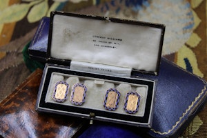 Downstairs at Grays: A very fine pair of engraved Blue & Black Chequered Enamel, Vintage, Cufflinks set in 9ct Yellow Gold, Circa 1930
