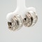 A pretty pair of platinum mounted baguette and brilliant cut diamond earrings - image 2