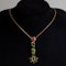 18 ct gold peridot and natural red spinel dangly pendant (with matching earrings) - image 1