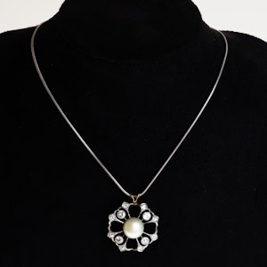Art Deco diamond and pearl  brooch/pendant. Gold on silver with chain in 18 ct  white gold