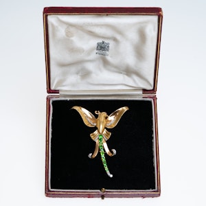 1920s demantoid garnet and diamond brooch of the paradise bird
