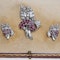 Earrings and brooch set in 18 ct white gold  with diamonds and rubies in fitted Garrards box - image 1