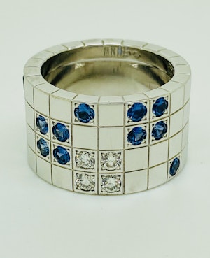 Cartier Lanieres, 0.40ct Diamond & 1.10ct Blue Sapphire Ring