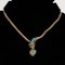 Victorian turquoise and ruby full snake necklace holding a heart - image 1