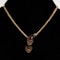 Victorian snake necklace  with garnets and amethysts holding a garnet heart set in 15 ct yellow gold - image 1