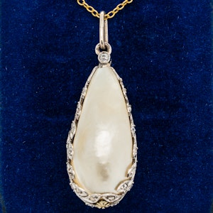 Blister pearl and diamond pendant on chain