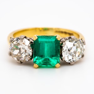 Emerald and diamond 3 stone ring