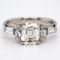 Diamond 3 stone ring with tapered baguettes diamond shoulders - image 1
