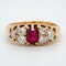 Ruby and diamond half hoop ring with trefoil shoulders - image 1