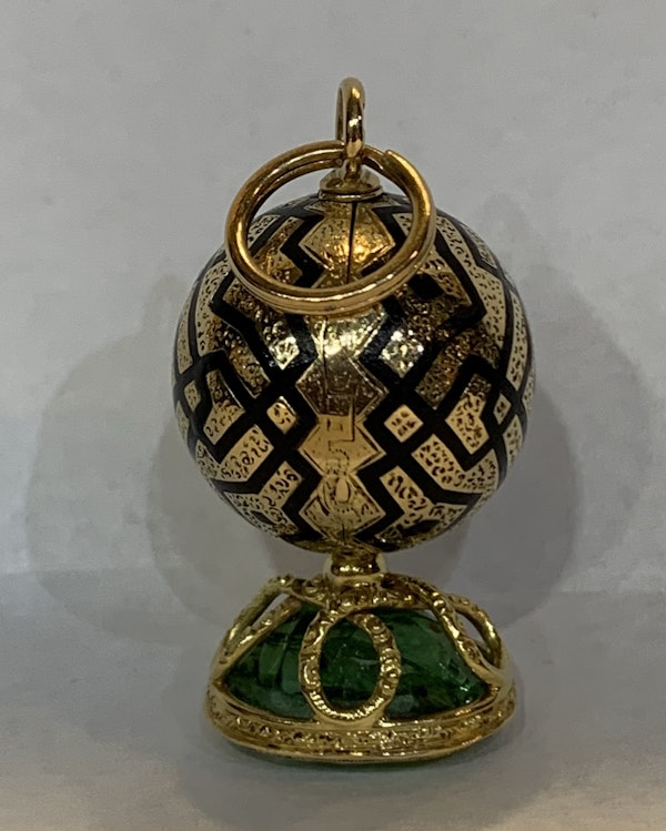 An enamel and 18 carat gold C19th orb seal that opens to reveal a gold cased green tourmaline with eye letter S engraved on the base of the stone - image 3