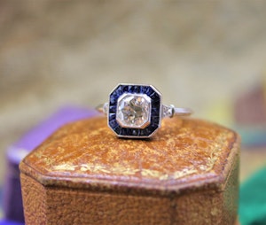 A very fine 0.85ct Diamond & Sapphire Target Ring mounted in Platinum, English, Circa 1920-1930