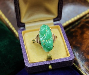 Downstairs at Grays: A superb Art Deco Carved Natural Jadeite Ring set in 9ct Yellow Gold, Circa 1930