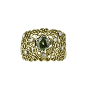 Gold Ring Set with a Tsavorite and Diamonds