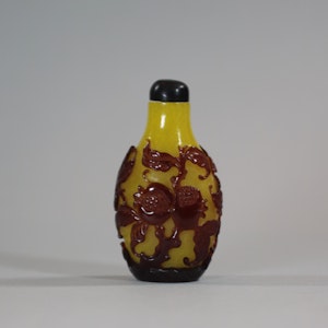 Rare Chinese red-overlay yellow glass snuff bottle, Qing dynasty, 19th Century