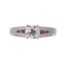 Diamond solitaire ring with diamond shoulders and ruby insets - image 1