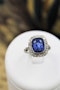 An exquisite 8.10ct Natural Untreated Ceylon Sapphire and Diamond Cluster Engagement Ring mounted in Platinum, English, Circa 1925 - image 3