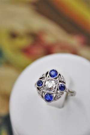 Downstairs at Grays: A very fine "Art Deco" Platinum (tested) Sapphire & Diamond "Quatrefoil" Cluster Ring. Circa 1930