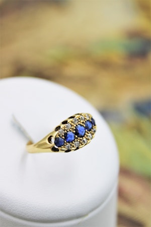 Downstairs at Grays: A fine Sapphire and Diamond Five Stone Ring mounted in 18ct Yellow Gold, English, Circa 1890