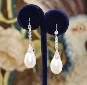 A fine pair of Pearl and Diamond Earrings set in 18ct White Gold, Pre-owned