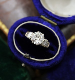 Downstairs At Grays: A very fine 1.16ct Diamond Solitaire Engagement Ring with Stepped Shoulders set in Platinum, English, Circa 1945