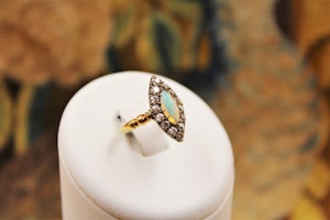 A Marquise-cut Australian Opal & Diamond Ring set in 18 Carat Yellow Gold & Silver, Circa 1900-1905