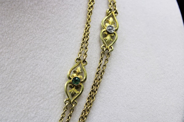 A very fine Art Nouveau double strung Long-Guard Chain set with Diamonds, Rubies, Emerald and Seed Pearls mounted in 18ct Yellow Gold, French, Circa 1900 - image 3