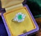 A very fine Emerald and Diamond Cluster Engagement Ring mounted in 18ct White Gold, English, Circa 1955 - image 3