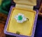 A very fine Emerald and Diamond Cluster Engagement Ring mounted in 18ct White Gold, English, Circa 1955 - image 1