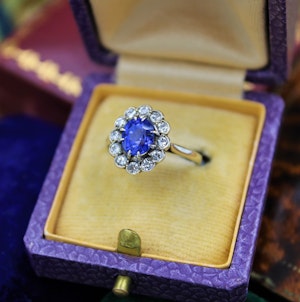 Downstairs at Grays: A very fine Sapphire & Diamond Cluster Engagement Ring mounted in 14ct White Gold, Continental, Circa 1930