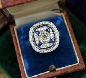 Downstairs at Grays: A very substantial "Art Deco" style Oval Diamond and Sapphire Plaque Ring, Mid to late 20th century. Pre-owned