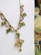 An exquisite Peridot & Seed Pearl Festoon La Belle Époque Necklace with a matching Quatrefoil style detachable Pendant/Brooch in 15 Carat Yellow Gold, English, Circa 1900 - image 1