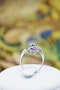 A fine Platinum Oval Ceylon Sapphire & Double Diamond Cluster Engagement Ring, Circa 1940.. - image 3