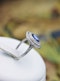 A fine Platinum Oval Ceylon Sapphire & Double Diamond Cluster Engagement Ring, Circa 1940.. - image 4