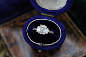 Downstairs at Grays: A very fine Emerald Cut Diamond Engagement Ring with Baguette Cut Shoulders set in 18ct White Gold, Pre-owned