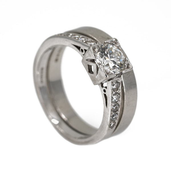 Diamond solitaire ring with diamond shoulders together with plain platinum wedding ring with a cut out for the diamond ring - image 2