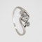 3 stone crossover diamond ring set in platinum - image 2
