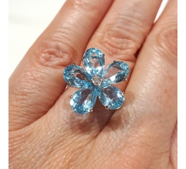 Blue Topaz And Diamond Flower Ring - image 2